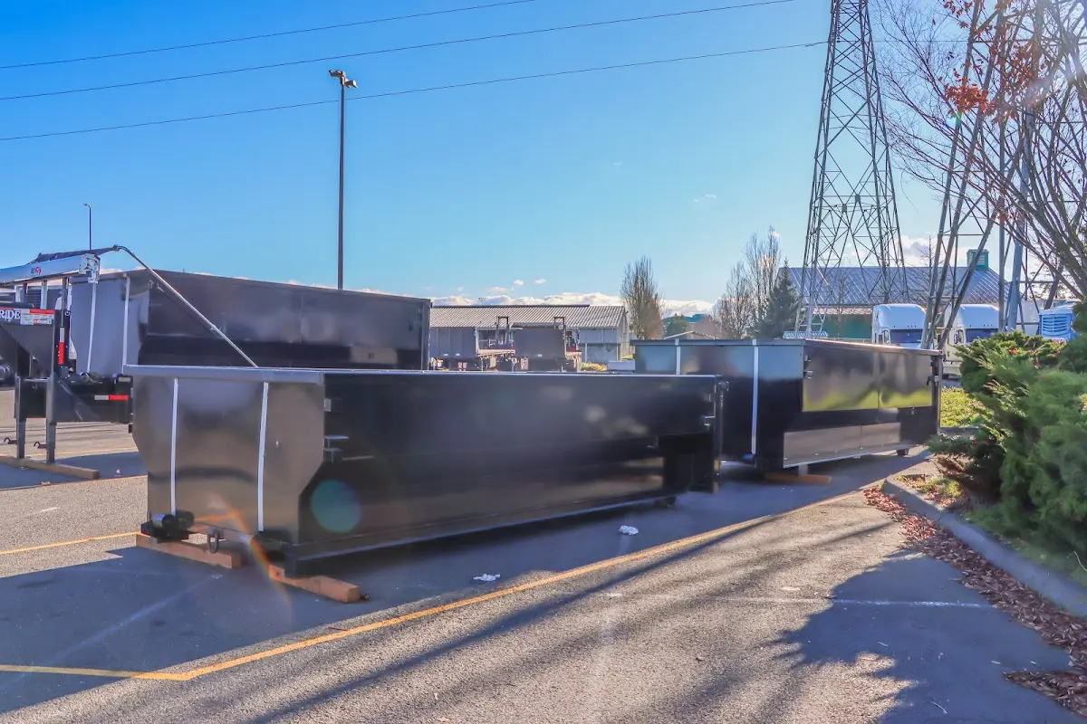 Roll-off dumpster ready for waste disposal at job site for Residential Dumpster Rental in Duluth